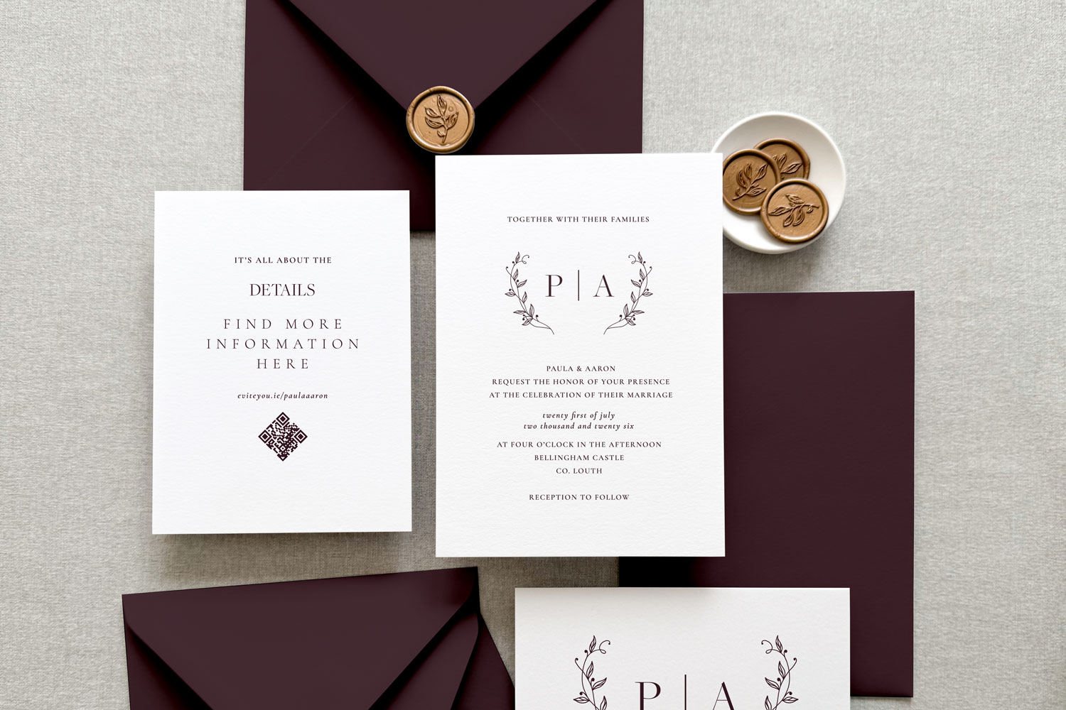 Burgundy Printed wedding invitations and save the dates with premium envelopes, wax seals, vellum and ribbon.