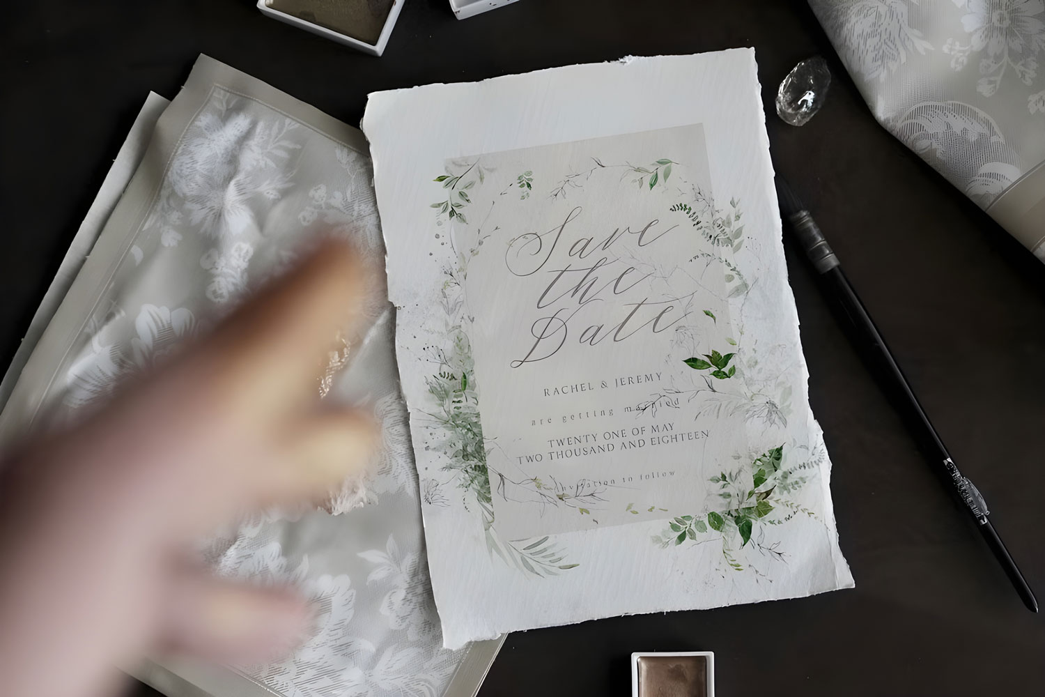 Lyra Printed wedding invitations and save the dates with premium envelopes, wax seals, vellum and ribbon.