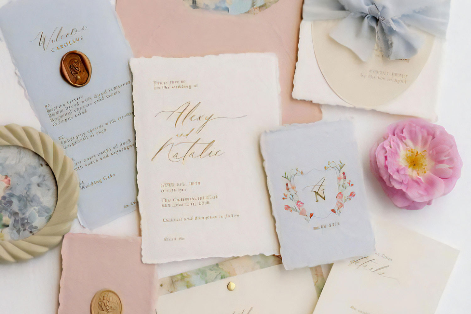 Pastels Printed wedding invitations and save the dates with premium envelopes, wax seals, vellum and ribbon.