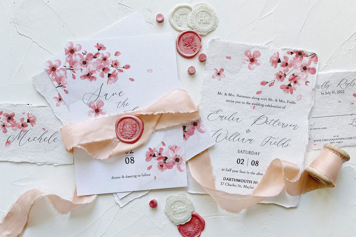 Cherry Blossom Printed wedding invitations and save the dates with premium envelopes, wax seals, vellum and ribbon.