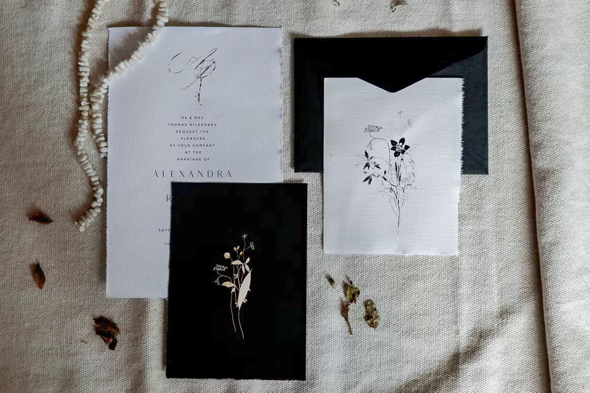 Gold Ink Printed wedding invitations and save the dates with premium envelopes, wax seals, vellum and ribbon.